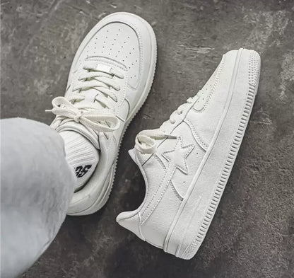 Triple White Star Sneaker